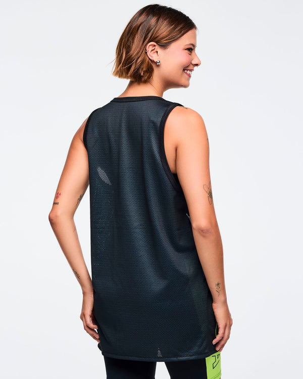 Black mesh sleeveless longline tank, shown from the back. A smiling female model wears the tank over black bike shorts with neon green side panels against a light gray background.