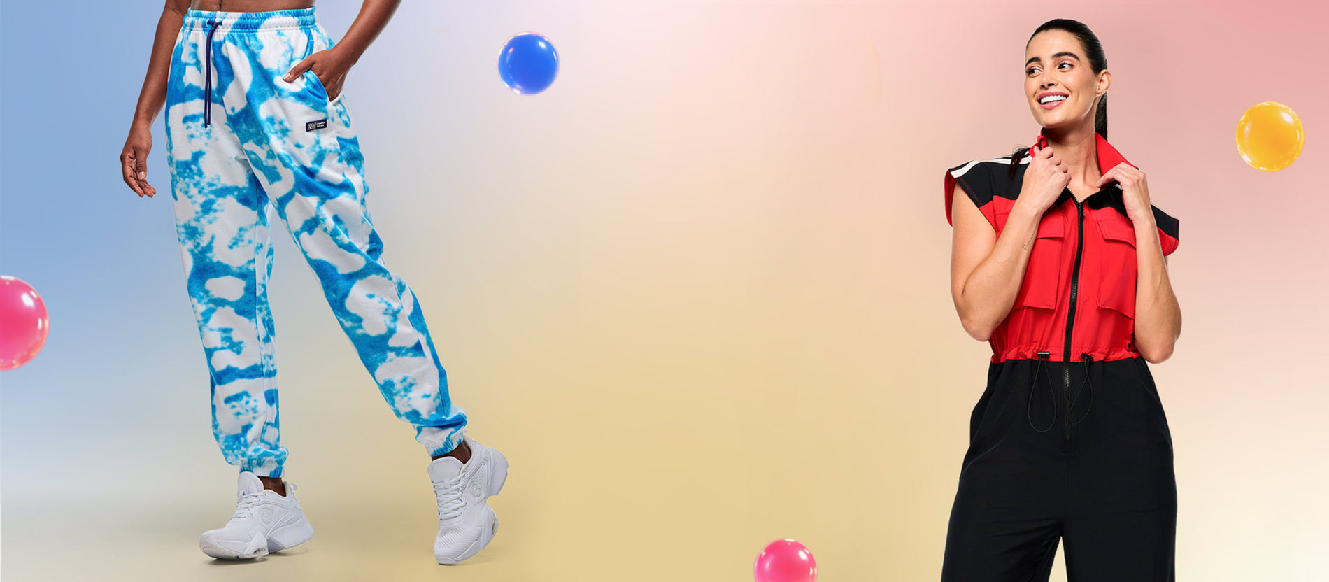 Two female models, one in white and blue cloud patterned pants and the other in a black and red bodysuit, on a cream background with colorful bubbles.