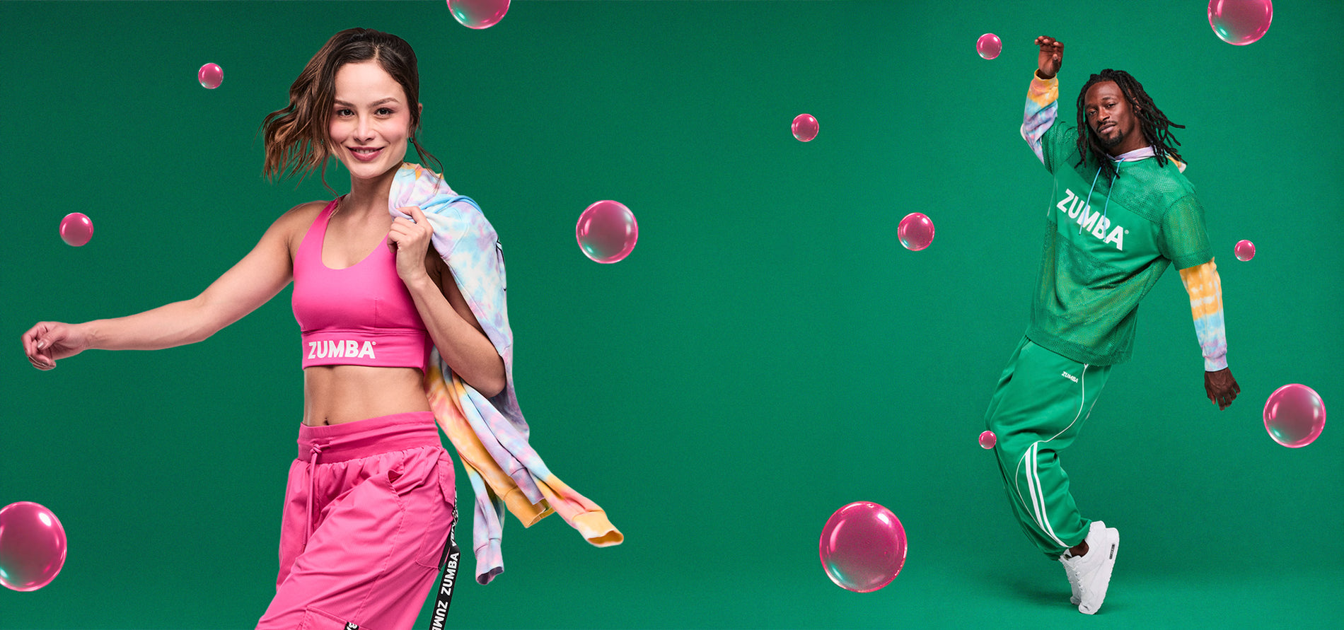Banner with female and male models in pink and green Zumba outfits on a green background with pink bubbles.