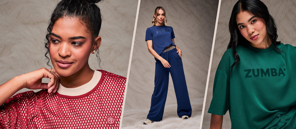 Three-panel banner separated by diagonal cream lines, set against a taupe faux fur backdrop. Left: Close-up of a female model in a red mesh crop top, layered over a beige top. Center: a female model in a navy crew neck top and matching pants. Right: a close-up of a female model in a teal green crop top with raised tonal 'ZUMBA' text.