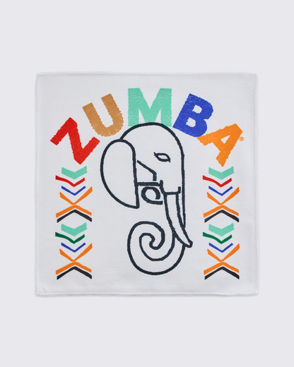 White square towel with a black embroidered elephant outline, multicolor ZUMBA lettering arched across the top, and colorful chevron accents on both sides.