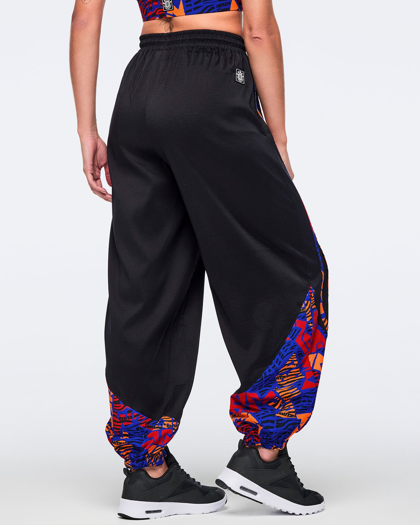 Wildbeat Woven Slouch Pants With Piping – Zumba Wear | STRONG iD