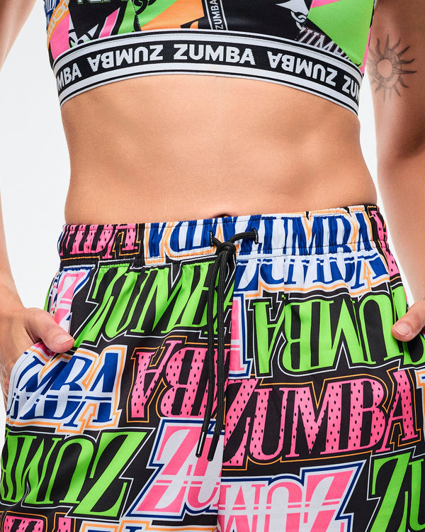 Close-up view of the elastic waistband and the black drawcords tied at the waist of a female model.