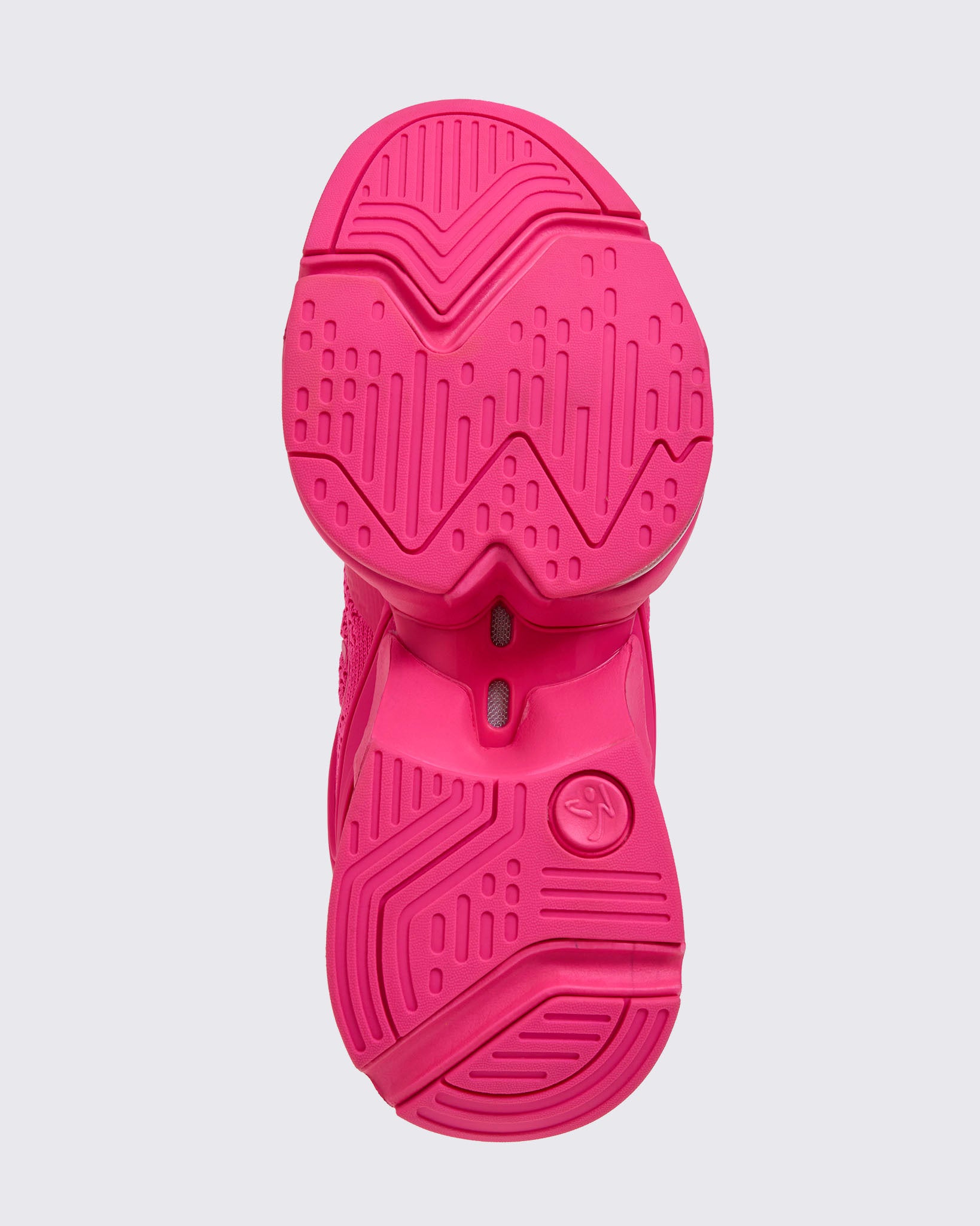 Pink sneaker sole on a light gray background.