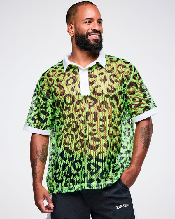 Male model wearing a green leopard print mesh polo with white collar.