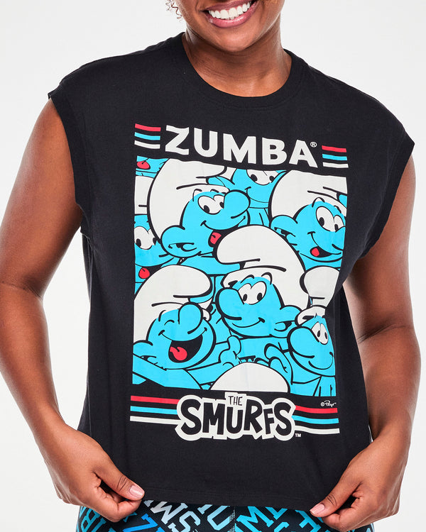 Close-up of the black tank's front graphic, showing the crowd of smiling Smurfs between the 'ZUMBA' text and 'THE SMURFS' logo, each flanked by red, blue, and white stripes.