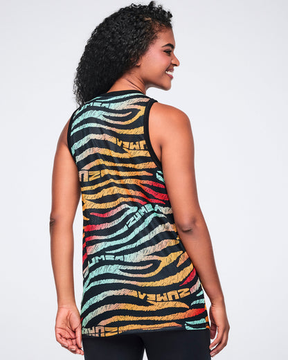 Female model wearing a sleeveless mesh tank in a black zebra-stripe print with multicolor brushstroke stripes in mint, yellow, orange, red, and beige, shown from the back with black leggings.