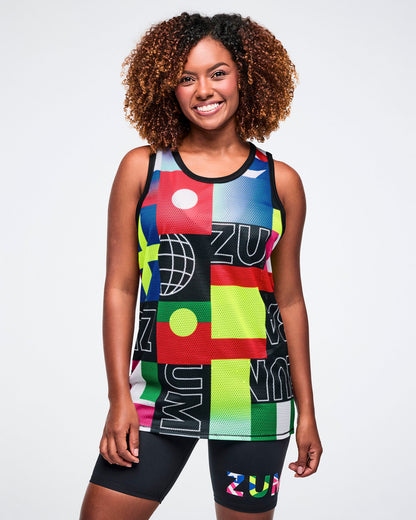 Female model wearing a colorful athletic tank top with geometric patterns and text on a white background.
