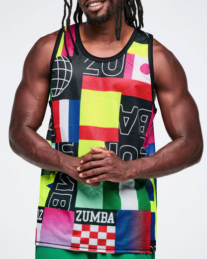 Close up of a male model wearing a colorful Zumba tank top with geometric patterns on a white background.
