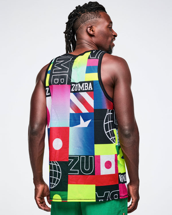 Male model wearing a colorful geometric-patterned tank top with, viewed from the back with Zumba branding against a white background.