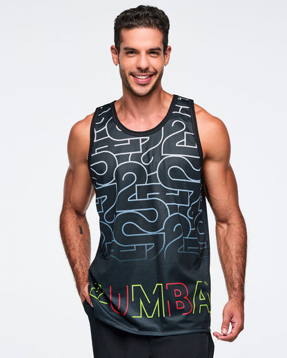 Black mesh tank with an allover silver 25 graphic and multicolor Zumba logo at the hem. A close-up of a smiling male model wears the sleeveless tank with black pants against a light gray background.