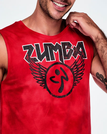 A close-up of a male model wearing a red tank top with a distressed black and white Zumba text with a large black Zumbito graphic with wings.