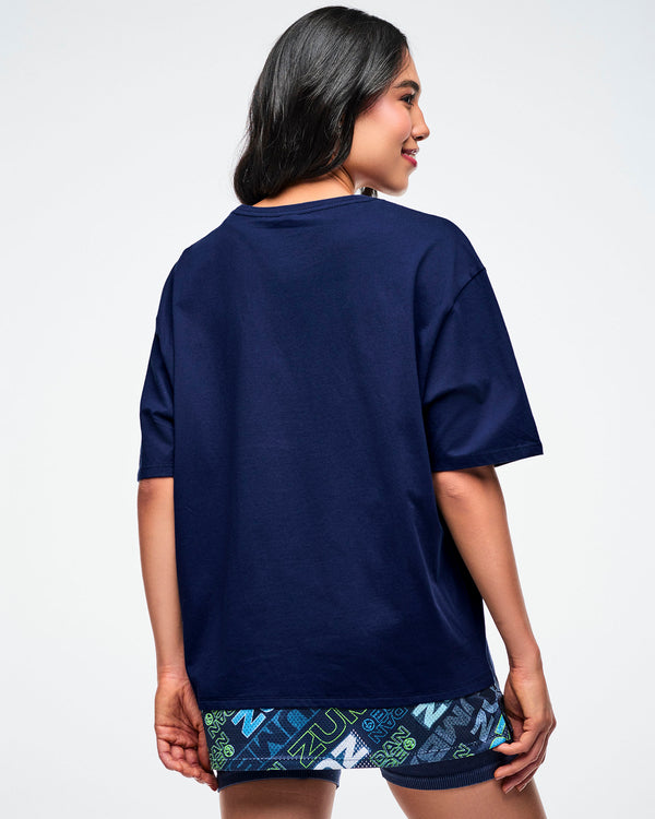 Back view of a female model wearing a blue 