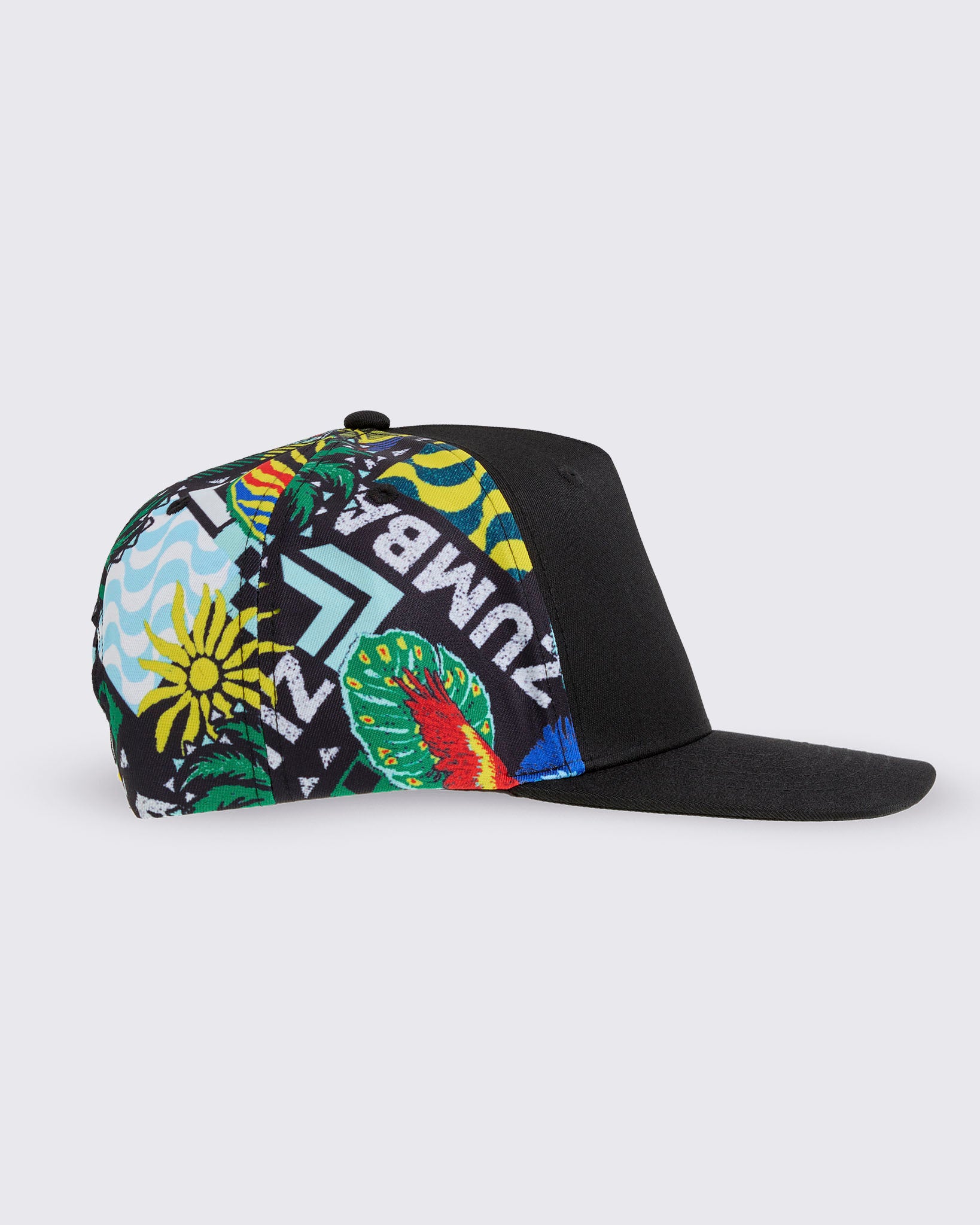 Product-only right-side profile of the cap, showing more of the tropical-print panels (including “ZUMBA” elements in the pattern) and the flat brim.