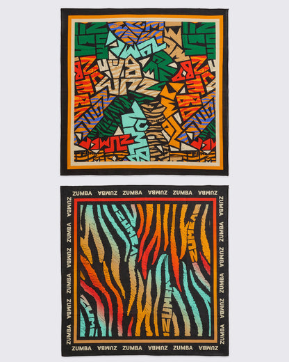 Two Zumba square bandanas shown flat against a light gray background, one with a multicolor abstract tribal print and one with a multicolor zebra-stripe print, both finished with black borders and repeating ZUMBA text around the edges.