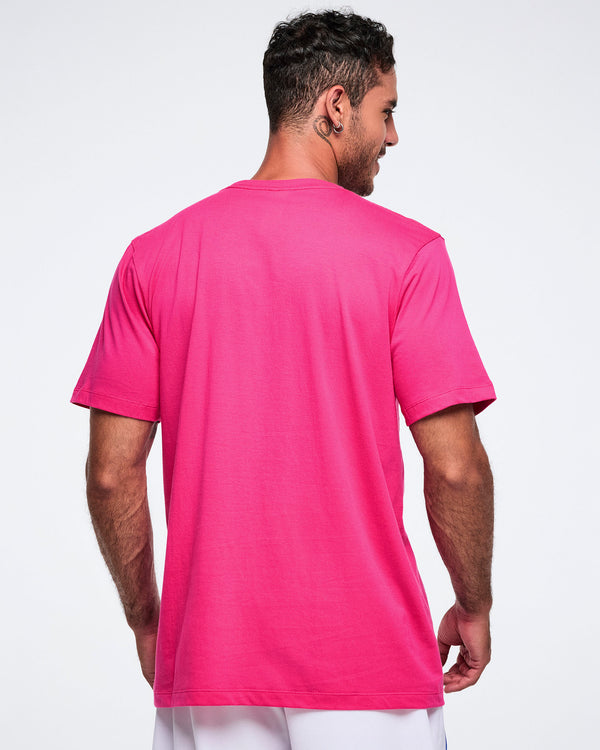 Back view of a male model wearing a bright pink t-shirt on a white background.