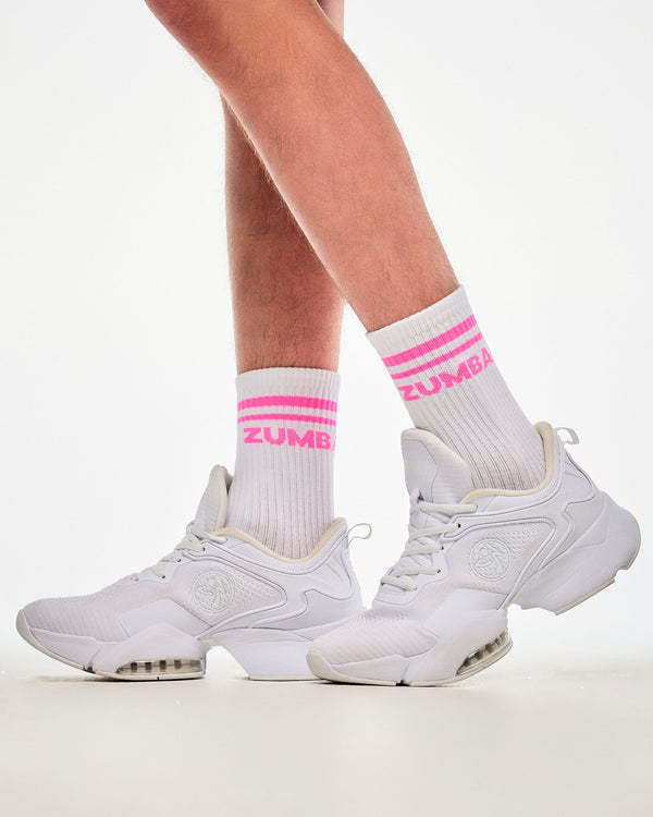 Close-up of white crew socks with pink stripes and 