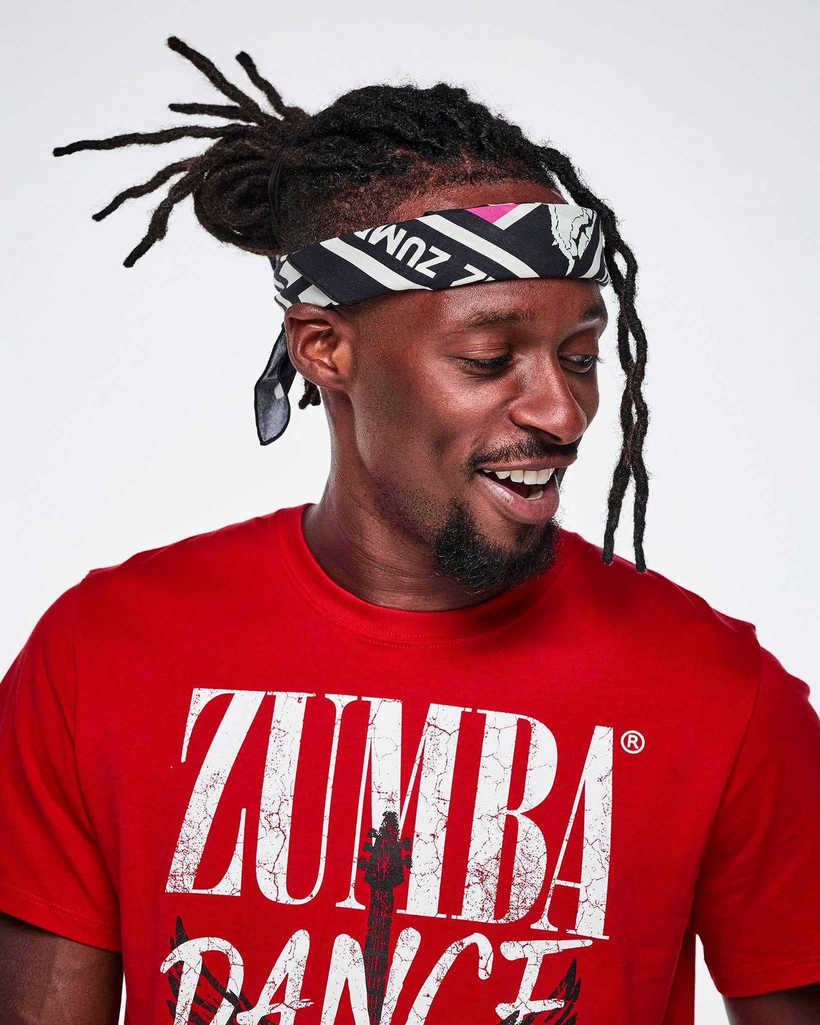 Close-up of a male model wearing a bandana as a headband.