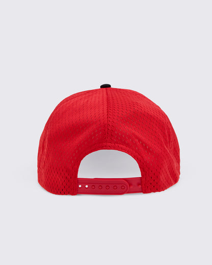 The red mesh of the baseball cap viewed from the back, featuring a curved snapback closure and a small black button on top.