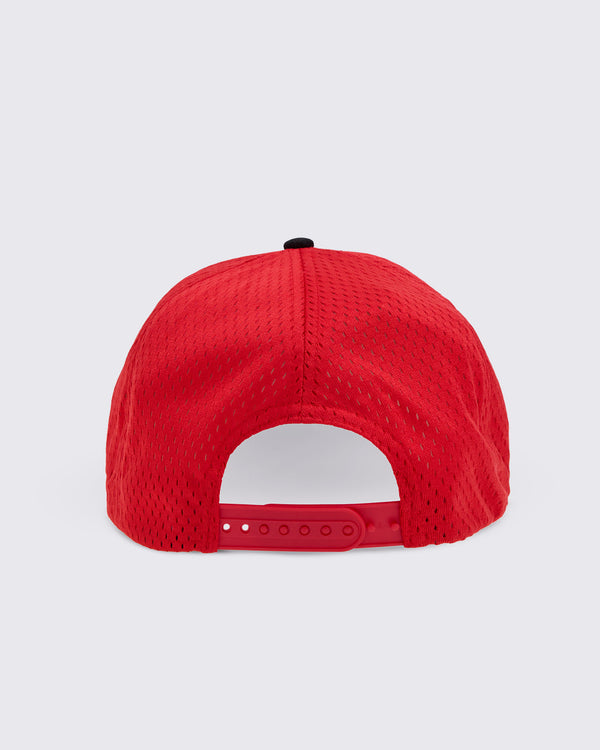 The red mesh of the baseball cap viewed from the back, featuring a curved snapback closure and a small black button on top.