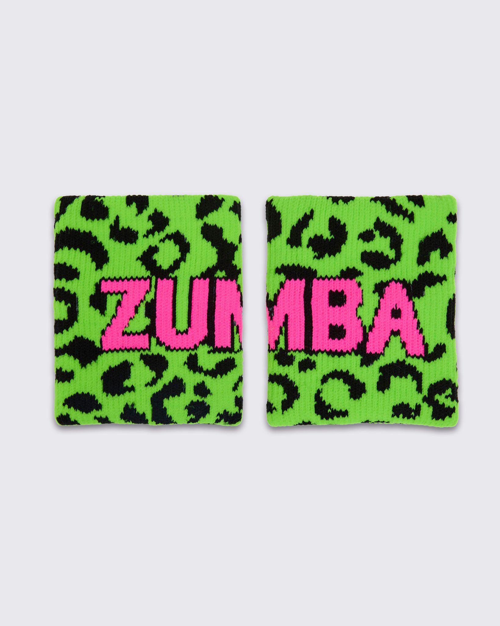 Two matching wristbands with a bright green and black leopard print background and the word 'ZUMBA' in large pink letters across the front, shown on a white background.