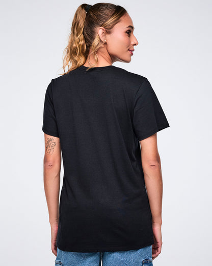 Back view of a female model wearing a black t-shirt on a white background.