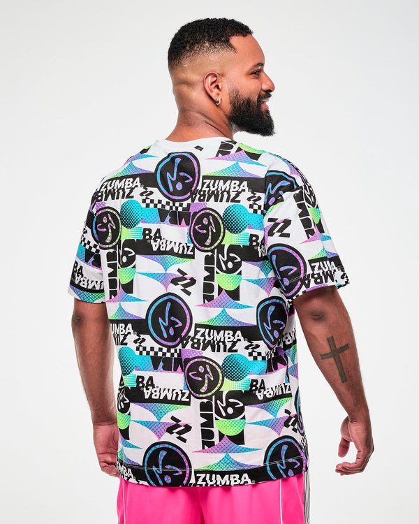 Back view of a male model wearing a white tee with a busy graphic pattern of repeated 