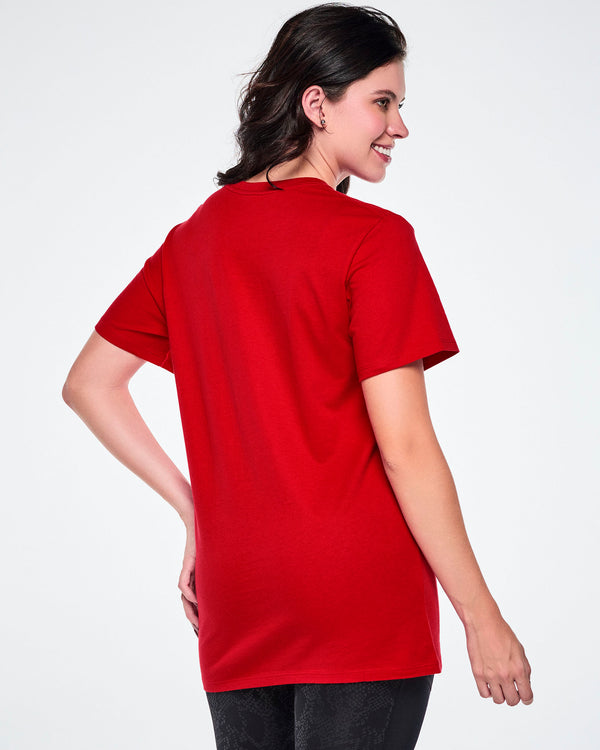 A female model wearing a red short-sleeve tee and black leggings.